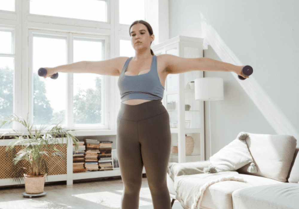 woman-working-out-weights-metabolic-weight-loss